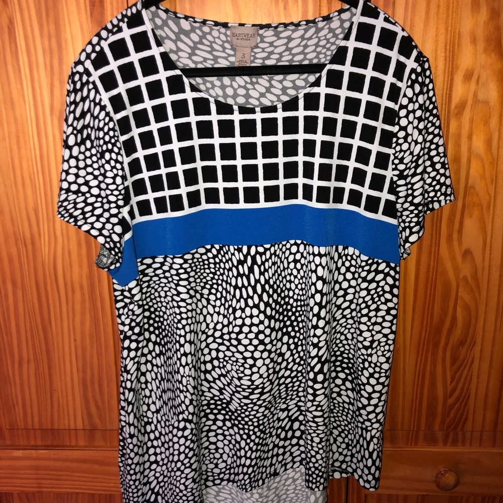 Chico's - Geometric print top with angled bottom.